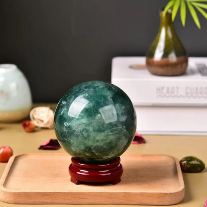 Natural Green Fluorite Crystal Sphere with Wooden Stand